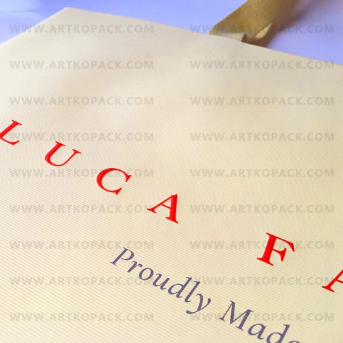 Kraft Paper Bag with all over embossing and embossed LOGO