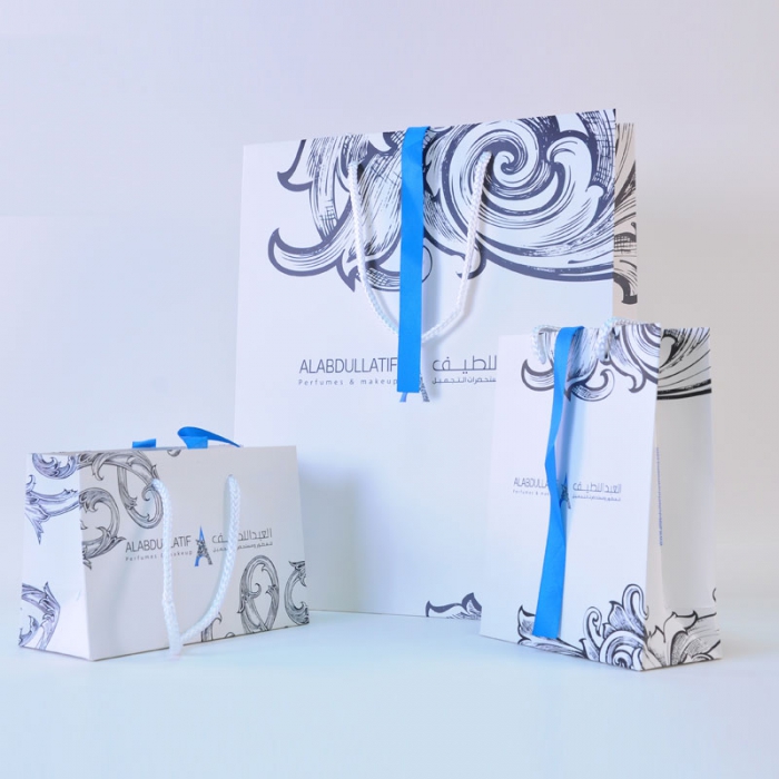 Art paper bag with ribbons