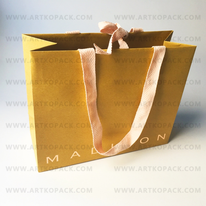 Luxury Shopping Bag with cotton handles glued into the turn-top